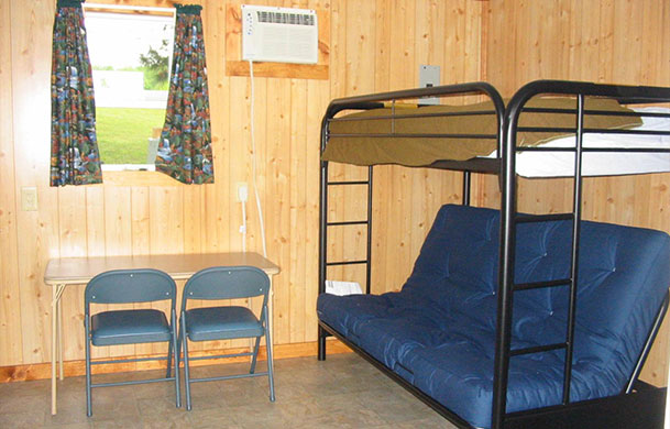 rustic lakefront sleeping cabin rental beds