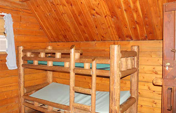 1 room cabin rental interior bunk bed